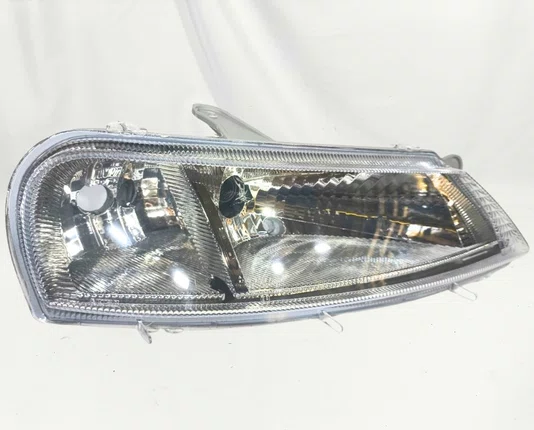 Farol Chevrolet Celta Mascara Cromada Lado Direito 2000 ate 2006
