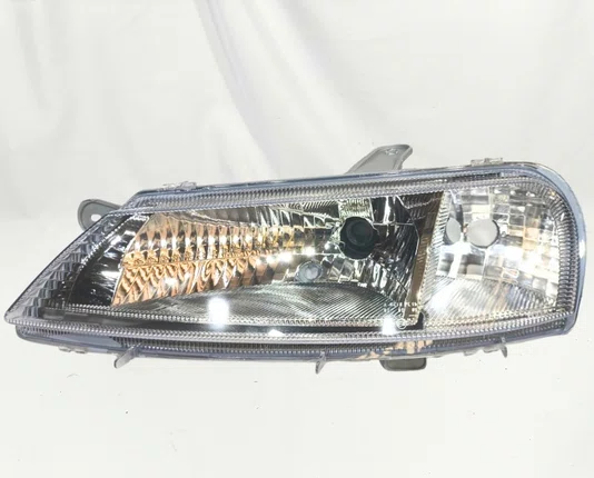 Farol Chevrolet Celta Mascara Cromada Lado Esquerdo 2000 ate 2006