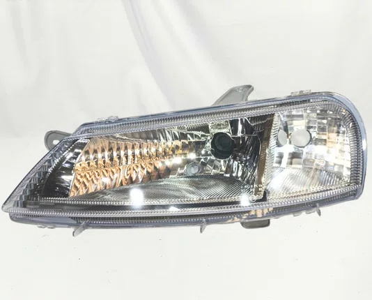 Farol Chevrolet Celta Mascara Cromada Lado Esquerdo 2000 ate 2006