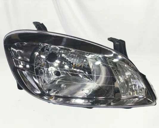 Farol Chevrolet Celta / Prisma Mascara Cromada Lado Direito 2006 ate 2012