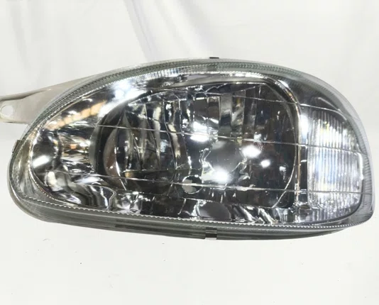 Farol de Vidro Chevrolet Corsa / Classic Mascara Cromada Cinza Lado Esquerdo 2000