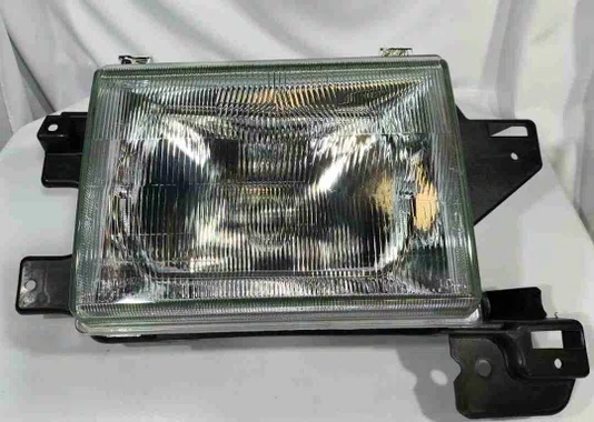 FAROL F1000 COM SUPORTE 1993 A 1996 LADO DIREITO