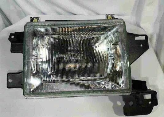 FAROL F1000 COM SUPORTE 1993 A 1996 LADO DIREITO