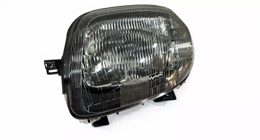Farol Principal com Regulagem Eletrica (Lado Esquerdo)  Renault Clio (1999 a 2002)