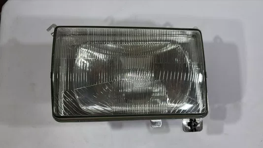 Farol Principal Dianteiro (Lado Esquerdo)  Caminho Ford Cargo
