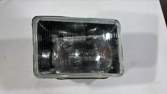 Farol Principal Dianteiro (Lado Esquerdo)  Fiat 147 Europa / Panorama