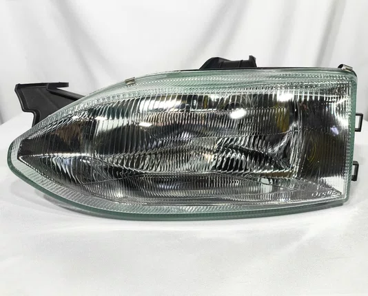 Farol Principal Fiat Palio / Siena / Strada Mascara Cromada Lado Esquerdo de 1996 ate 1998