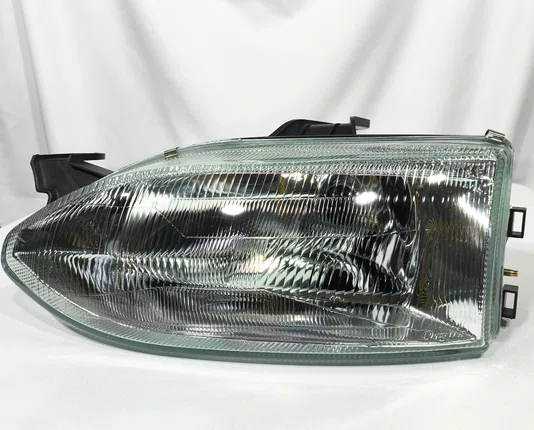 Farol Principal Fiat Palio / Siena / Strada Mascara Cromada Lado Esquerdo de 1996 ate 1998