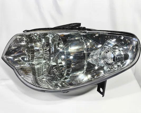 Farol Principal Fiat Palio / Siena / Strada Mascara Cromada Lado Esquerdo de 2004 ate 2016