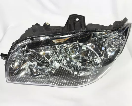 Farol Principal Fiat Palio / Siena / Strada Mascara Cromada Lado Esquerdo de 2004 ate 2016
