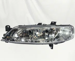 Farol Principal Chevrolet Vectra Máscara Cromada Lado Esquerdo 2000 até 2005