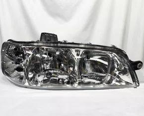 Farol Principal Fiat Palio / Siena / Strada Máscara Cromada, Carcaça Preta Lado Direito de 2001 até 2003