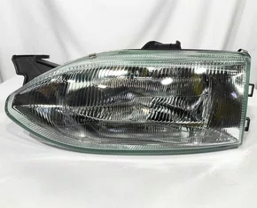 Farol Principal Fiat Palio / Siena / Strada Máscara Cromada Lado Esquerdo de 1996 até 1998