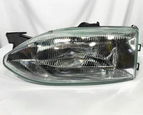 Farol Principal Fiat Palio / Siena / Strada Mascara Cromada Lado Esquerdo de 1996 ate 1998
