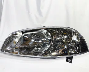 Farol Principal Fiat Palio / Siena / Strada Mascara Cromada Lado Esquerdo de 2007 ate 2020