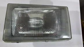 Farol Principal (Lado Esquerdo/Motorista)  Caminhoes Volvo NL (1987 a 1997)